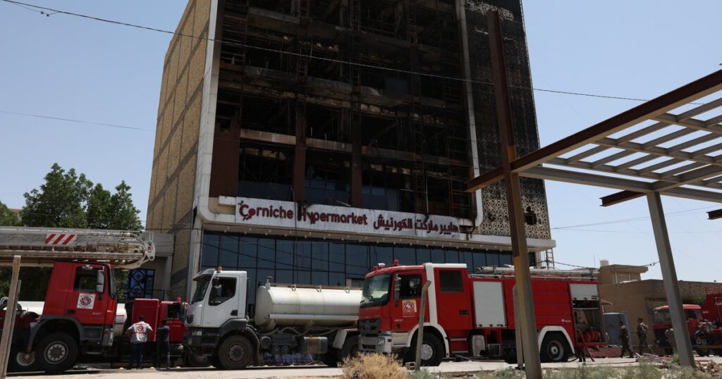 Fire guts Iraq shopping center, killing at least 61 people, officials say