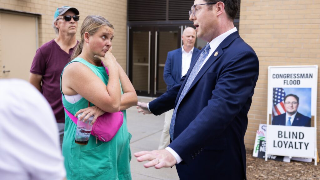 Mike Flood — booed at town hall — still stands by Trump’s agenda : NPR