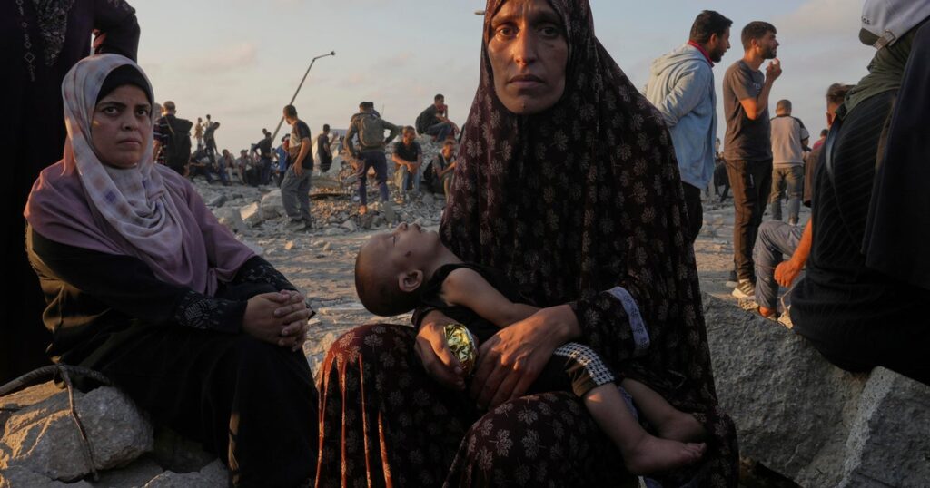 New Israeli strikes around Gaza kill at least 33 as famine announcement raises pressure