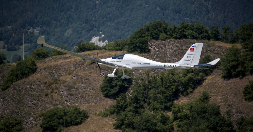 Pilot breaks altitude record for solar-powered plane, crossing paths with commercial airliner, his team says