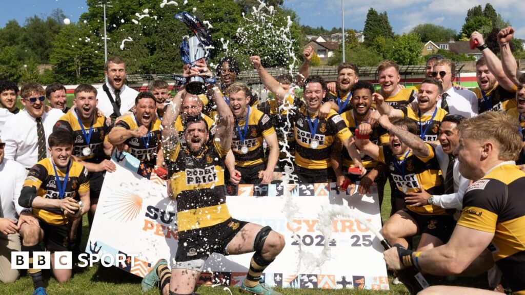 Newport captain Ben Roach lifts the Super Rygbi Cymru trophy after their win in Ebbw Vale