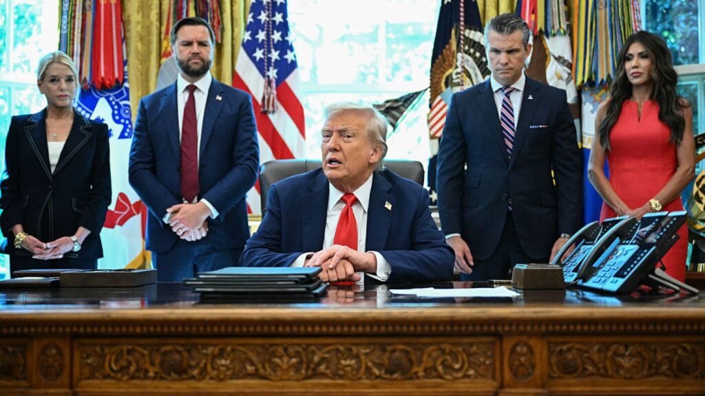 Trump hedges on Chicago plans but says National Guard is ready : NPR