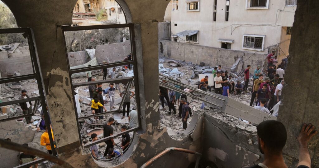 Airstrikes and shooting kill at least 59 people in Gaza as calls for ceasefire grow