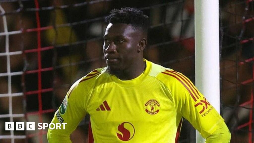 Manchester United's Andre Onana in the club's yellow goalkeeper shirt