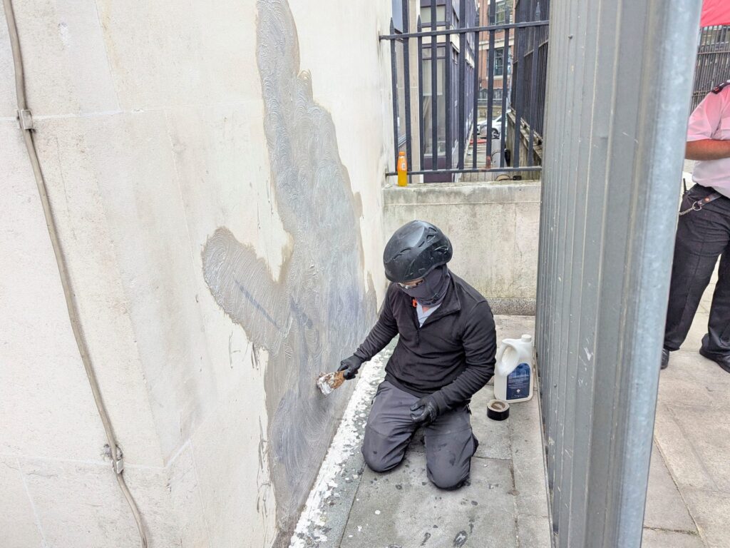 Banksy mural of UK judge hitting protester scrubbed from London court wall | Israel-Palestine conflict News