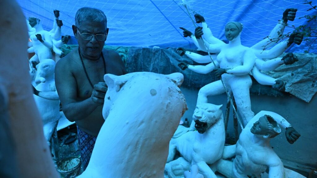 Idol makers from West Bengal come to Kochi to make idols of Durga and her family during Durga Puja