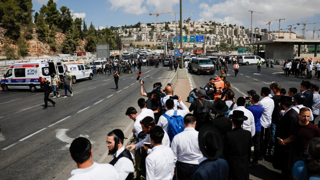 People flee shooting at illegal Israeli settlement