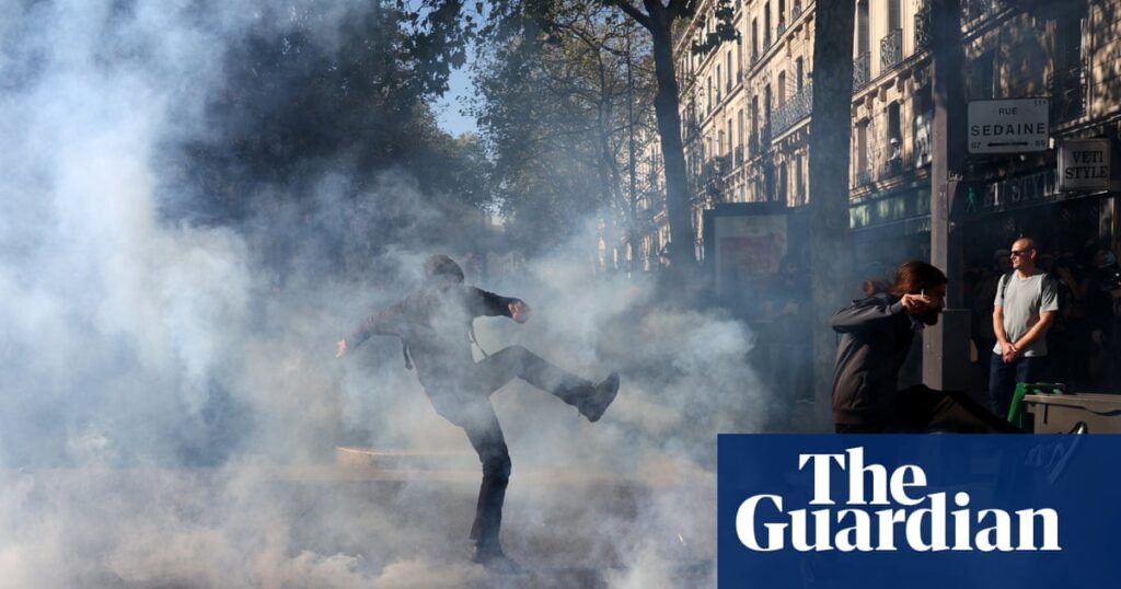 Police fire teargas at striking protesters in Paris – video | France