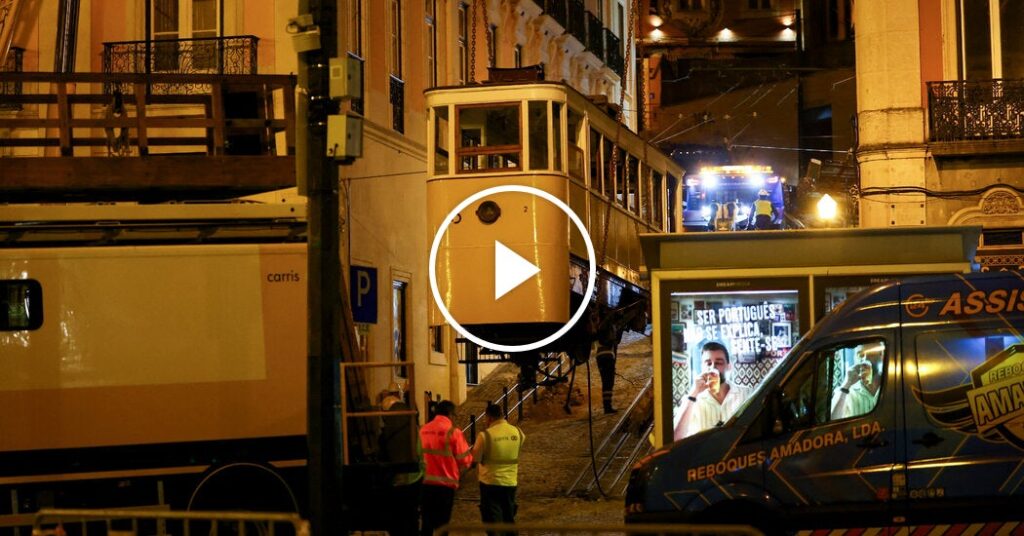 Workers Remove Wreckage of Lisbon Funicular