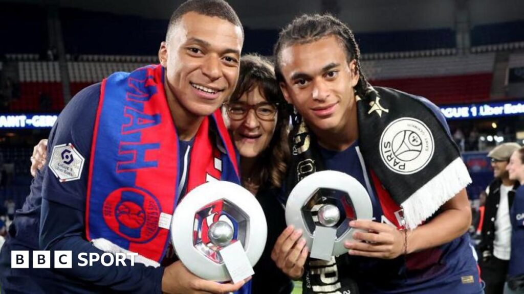 Kylian Mbappe and his brother Ethan along with their mother
