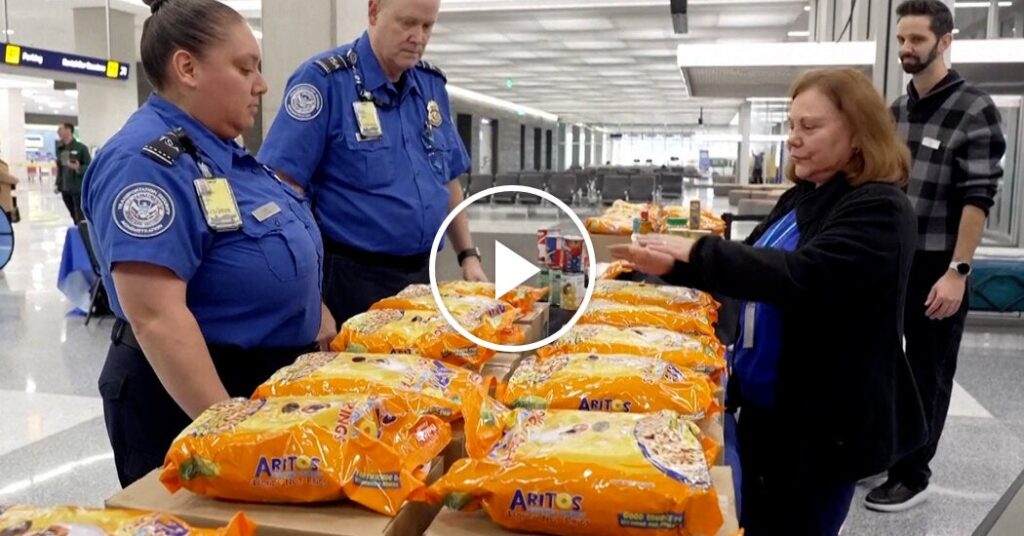 Federal Airport Workers Collect Food Aid
