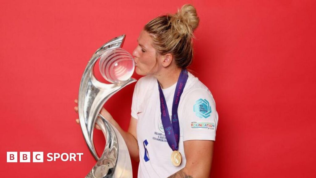 Millie Bright kisses the European Championship trophy after winning it with England in 2022