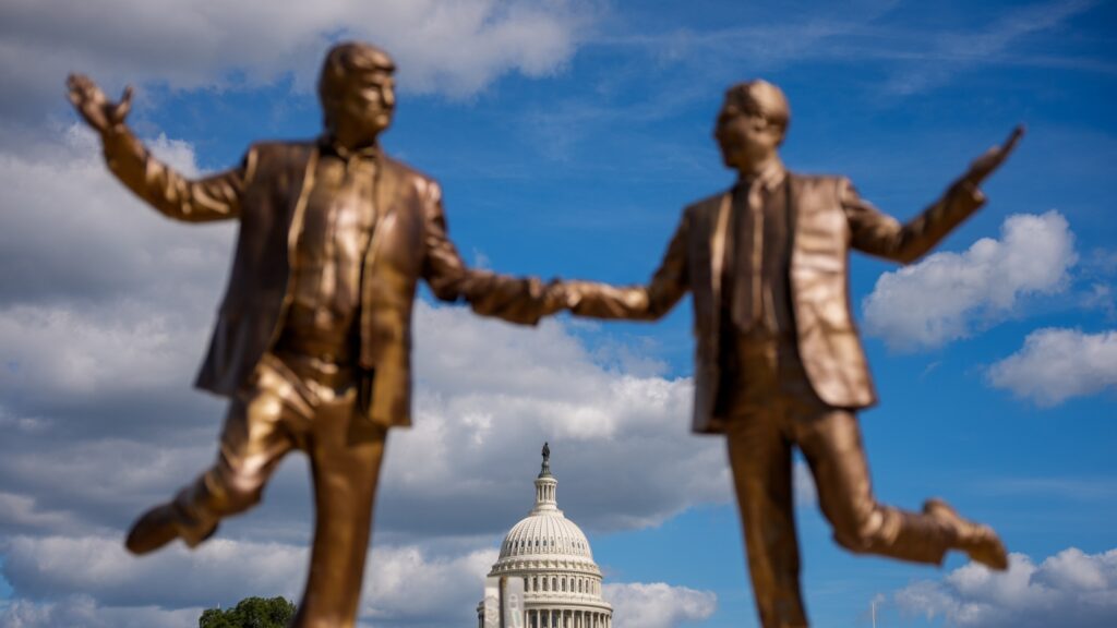 Trump-Epstein statue returns to National Mall : NPR
